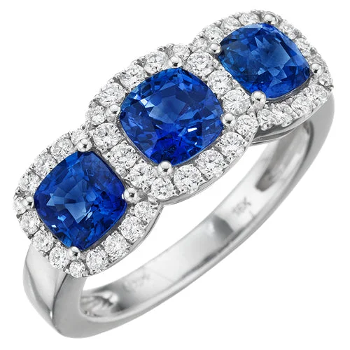 women's engagement rings with intricate details -Cushion Shaped Blue Sapphire & Diamond Halo 18K White Gold Three Stone Ring