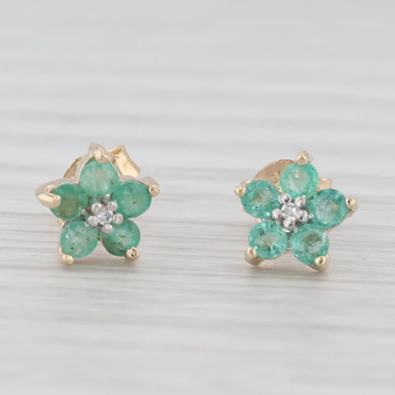 women's earrings with twisted metal -0.40ctw Emerald Diamond Flower Stud Earrings 10k Yellow Gold