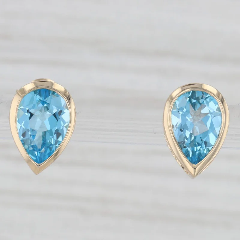 women's earrings with dangling pendants -4.80ctw Pear Solitaire Blue Topaz Stud Earrings 14k Yellow Gold