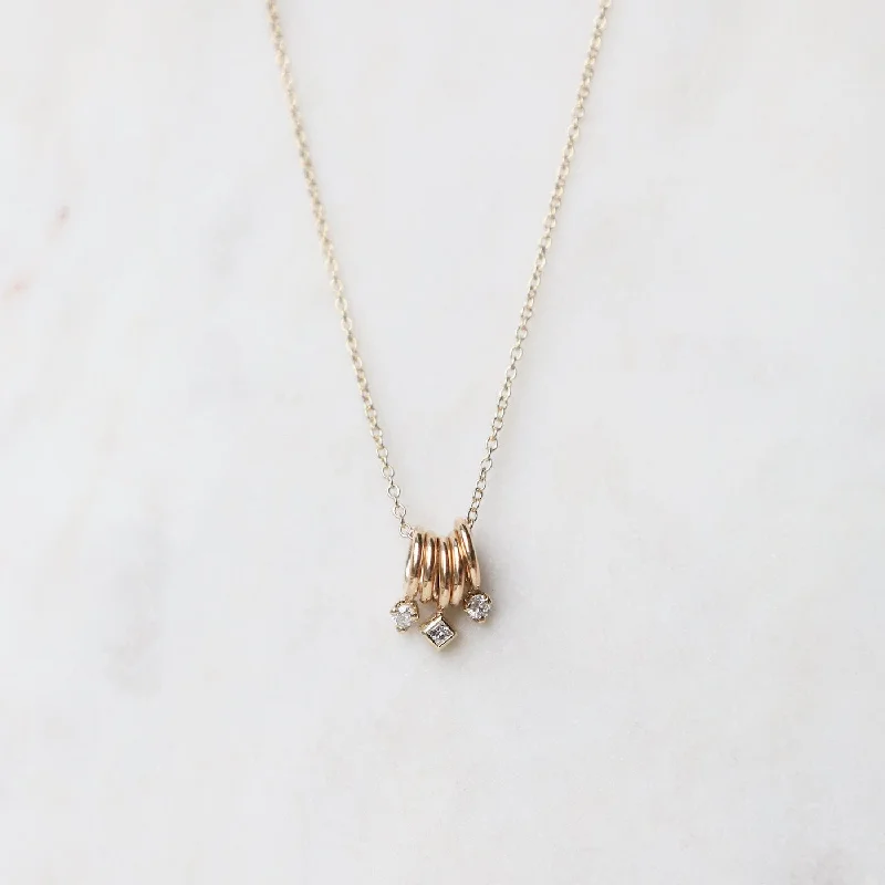 women's necklaces with luxury stones -14k Gold 5 Tiny Rings Necklace with Mixed Diamonds