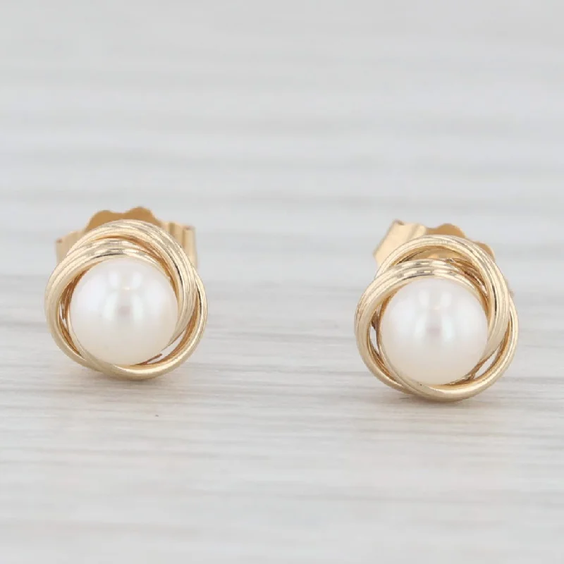 women's earrings with emerald -Round White Cultured Pearl Knot Stud Earrings 14k Yellow Gold