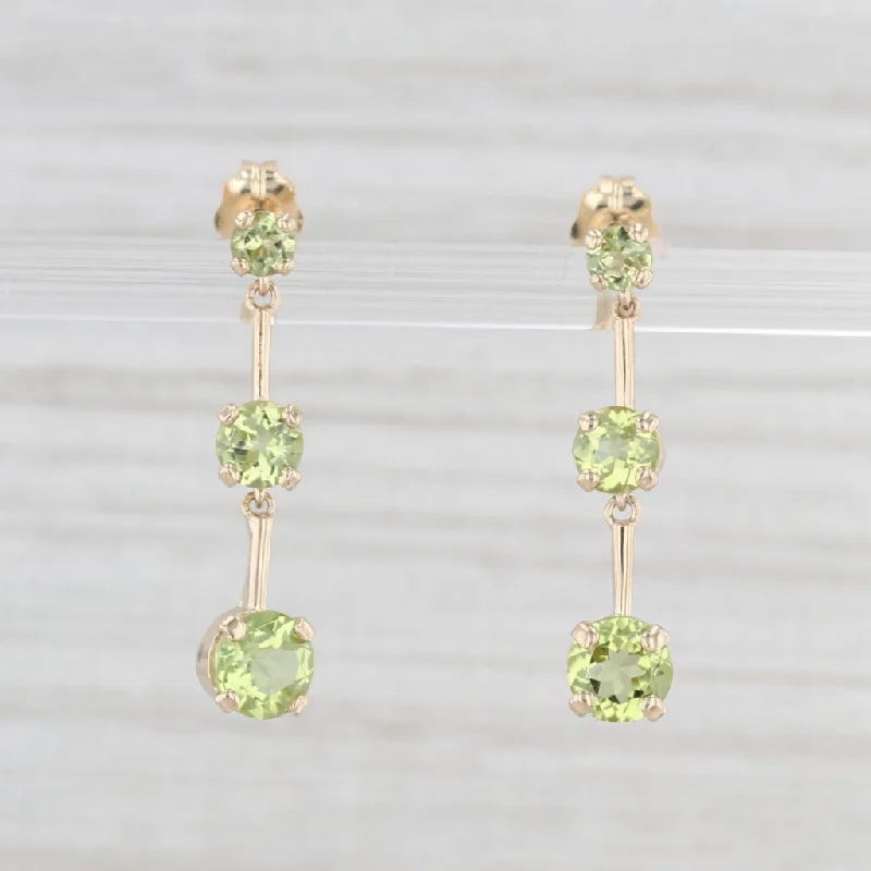 women's earrings with elegant drop -1.85ctw Peridot Graduated 3-Stone Dangle Earrings 10k Yellow Gold