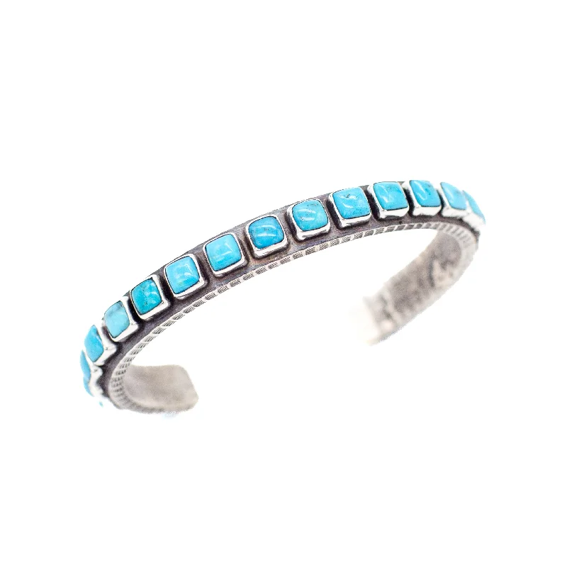 women's bracelets with vintage look -Ernest Rangel Navajo Handmade Tufa Cast Sterling Silver Turquoise Cuff Bracelet