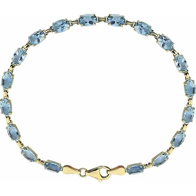 women's bracelets with multiple layers -14KT YELLOW GOLD SKY BLUE TOPAZ BRACELET - 7.25"