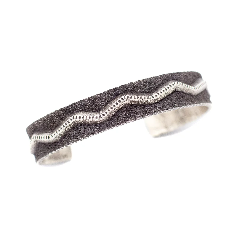 women's bracelets with round beads -Ernest Rangel Navajo Handmade Tufa Cast Sterling Silver Cuff Bracelet