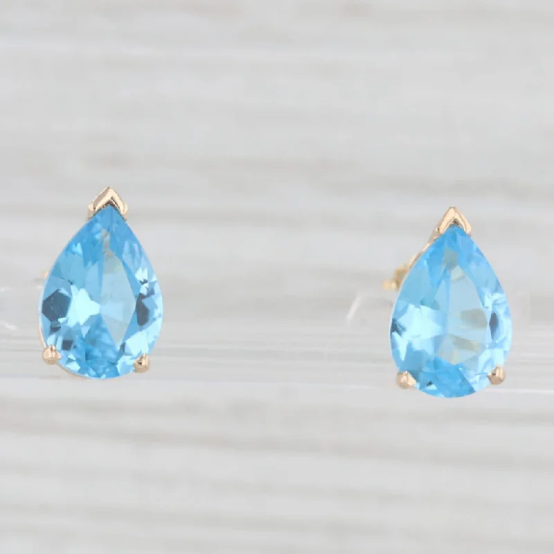 women's earrings with glittering diamonds -5ctw Pear Solitaire Blue Topaz Stud Earrings 14k Yellow Gold