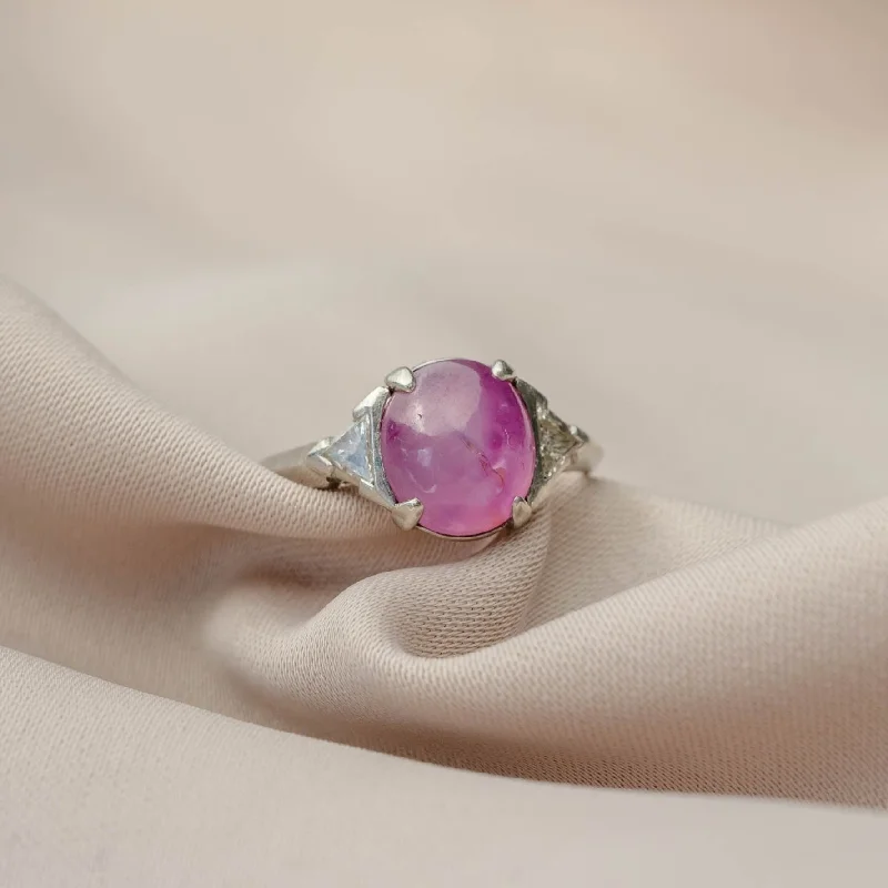 women's engagement rings with emerald-cut stone -Cabochon Oval Pink Sapphire Platinum Ring with Trillion Cut Diamonds