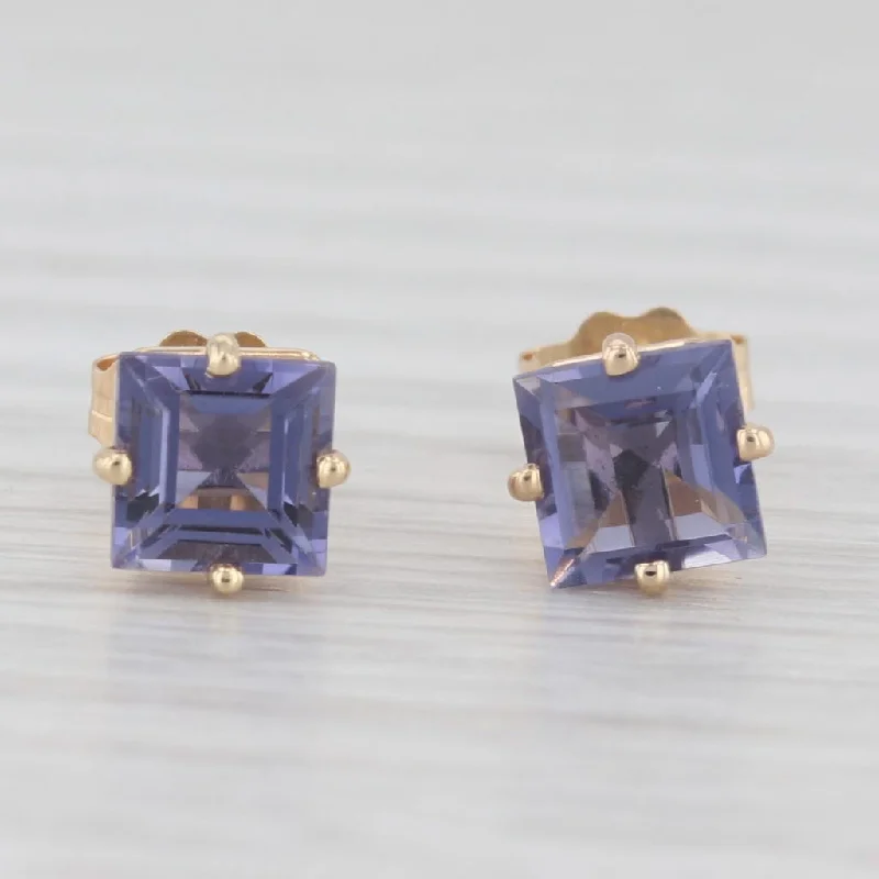 women's earrings with teardrop gemstones -1.14ctw Purple Blue Iolite Stud Earrings 14k Yellow Gold Princess Solitaires